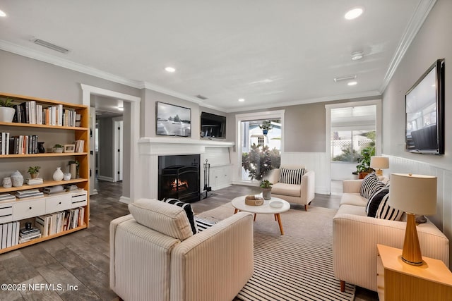 living room with crown molding and dark wood-type flooring