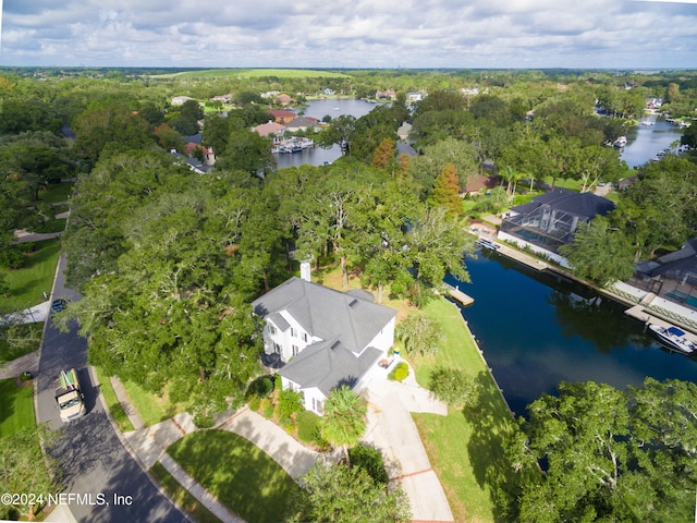 birds eye view of property featuring a water view