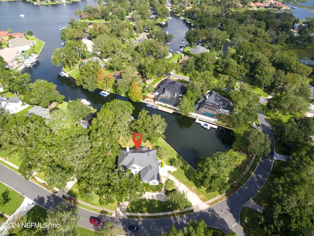 drone / aerial view with a water view