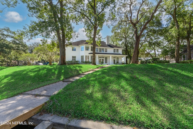 victorian house with a front lawn