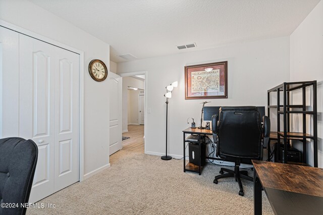 view of carpeted office space