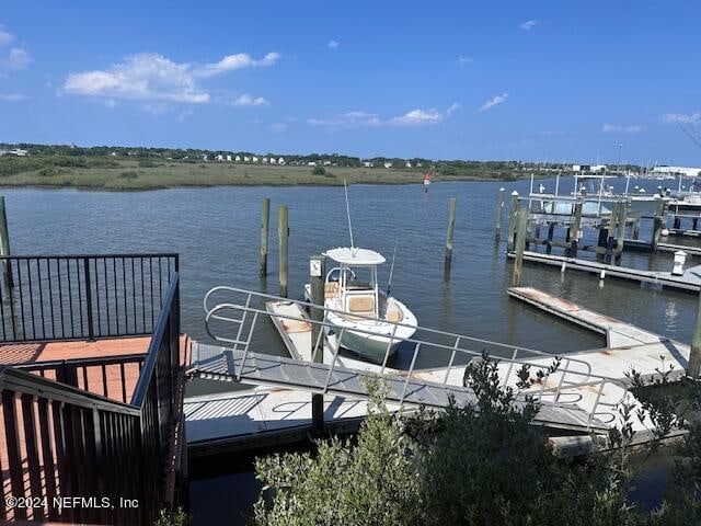 view of dock with a water view