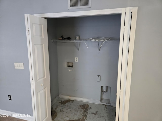 clothes washing area with washer hookup