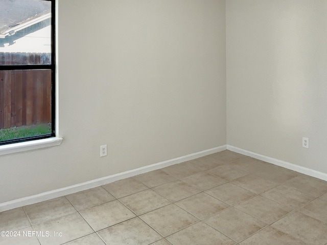 view of tiled spare room