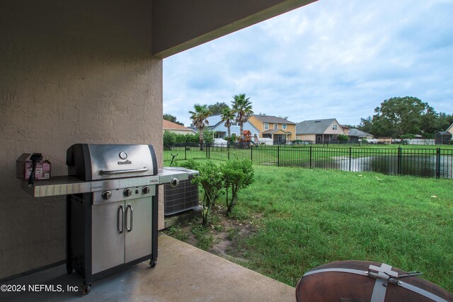 view of yard featuring central AC