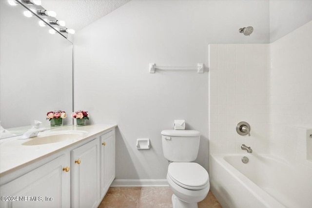 full bathroom with vanity, a textured ceiling, toilet, bathtub / shower combination, and tile patterned floors