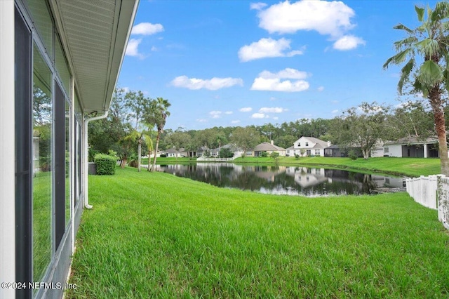 view of yard with a water view