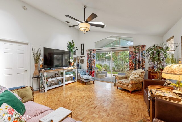 living room featuring ceiling fan, light parquet flooring, and high vaulted ceiling