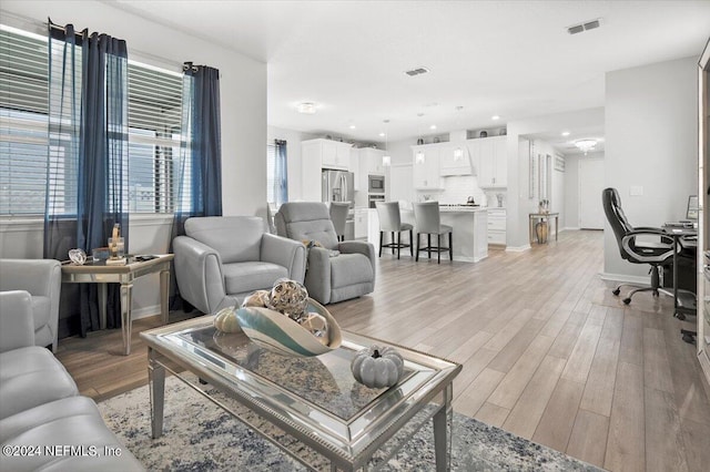 living room featuring light wood-type flooring