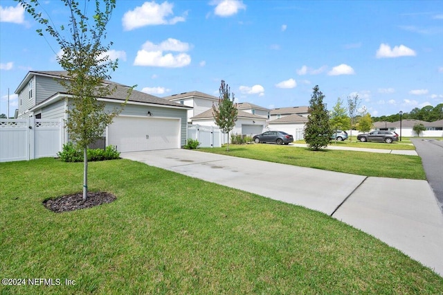 ranch-style home with a garage and a front lawn