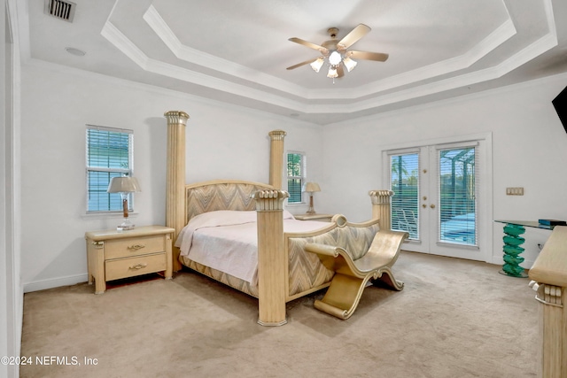 bedroom with french doors, light carpet, access to outside, and multiple windows