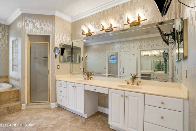 bathroom featuring vanity, crown molding, and separate shower and tub