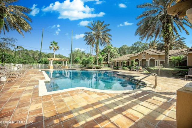 view of pool with a patio area