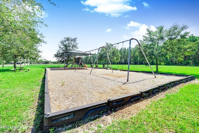 view of playground featuring a yard