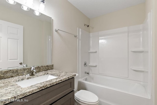 full bathroom with vanity, toilet, and shower / bathing tub combination