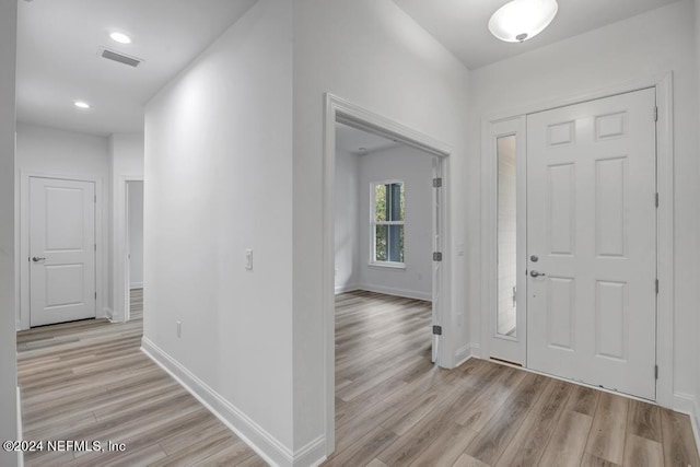 foyer entrance featuring light hardwood / wood-style flooring