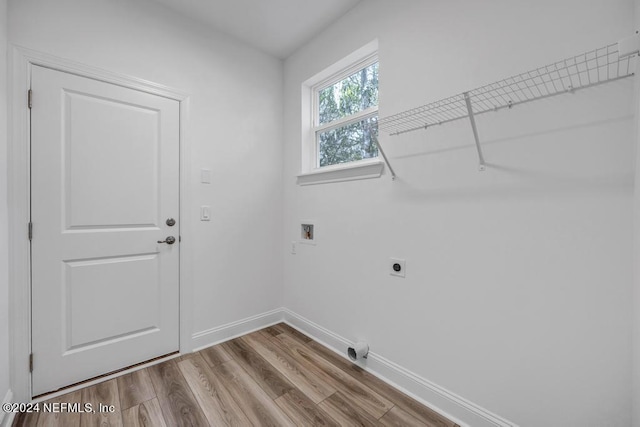 laundry room with washer hookup, light wood-type flooring, and electric dryer hookup