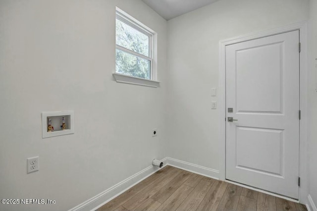 laundry room with washer hookup, light wood finished floors, hookup for an electric dryer, laundry area, and baseboards