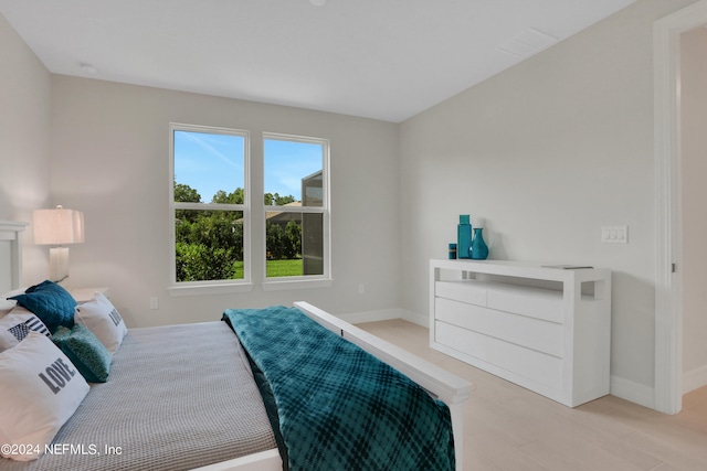 bedroom featuring light hardwood / wood-style floors