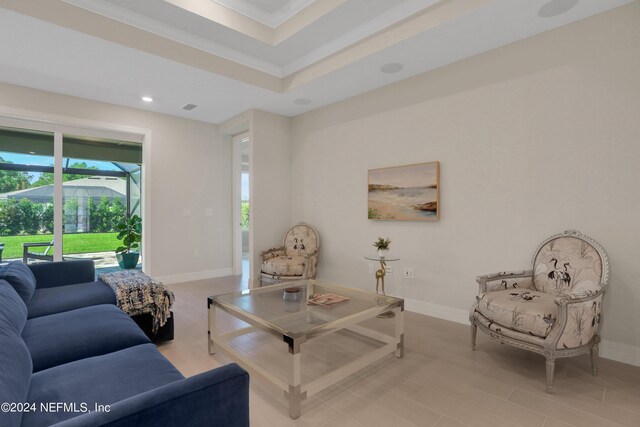 living room featuring crown molding