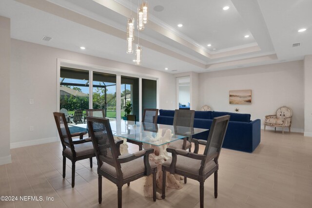 dining area with ornamental molding