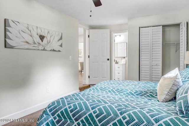 bedroom with carpet floors, ensuite bath, ceiling fan, and a closet