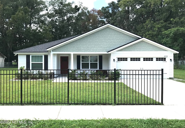 view of front facade with a porch, a garage, and a front yard