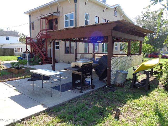 back of property with a patio area