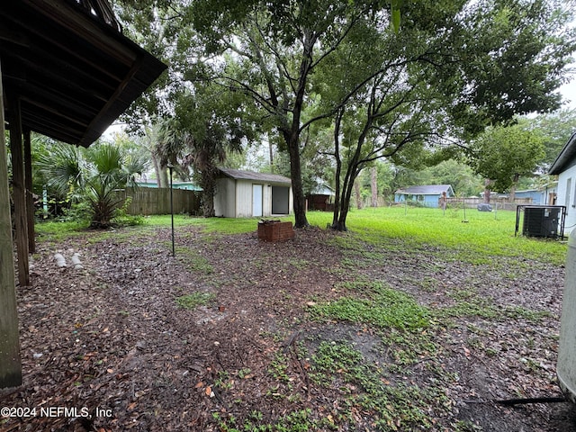 view of yard with a shed