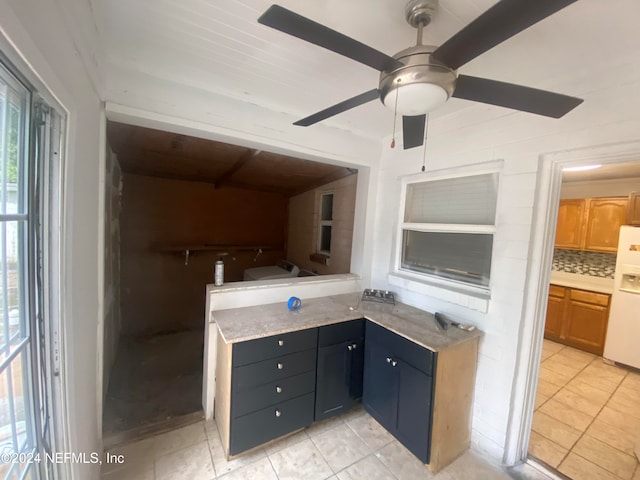 bathroom with ceiling fan, backsplash, and tile patterned flooring