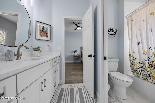 full bathroom featuring wood-type flooring, shower / tub combo with curtain, ceiling fan, vanity, and toilet