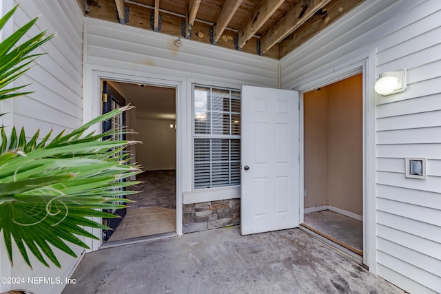 doorway to property featuring a patio