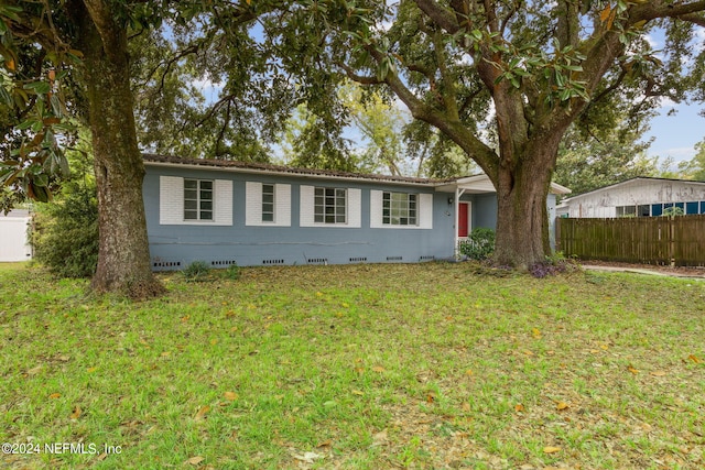 6124 Sudbury Ave S, Jacksonville, FL 32210 - single story home with a front lawn, crawl space, fence, and brick siding