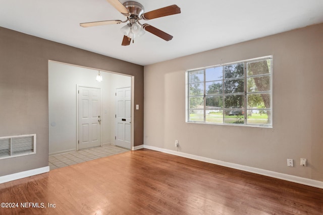 interior space featuring ceiling fan and wood-type flooring