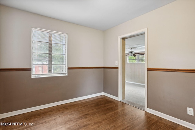 empty room with wood-type flooring