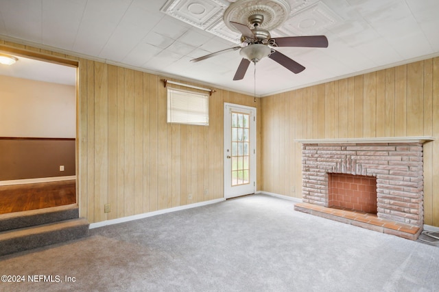 6124 Sudbury Ave S, Jacksonville, FL 32210 - unfurnished living room featuring a brick fireplace, baseboards, carpet flooring, and a ceiling fan
