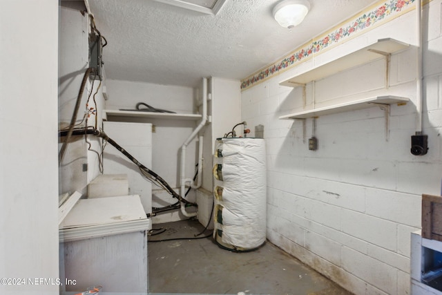 interior space with water heater and a textured ceiling