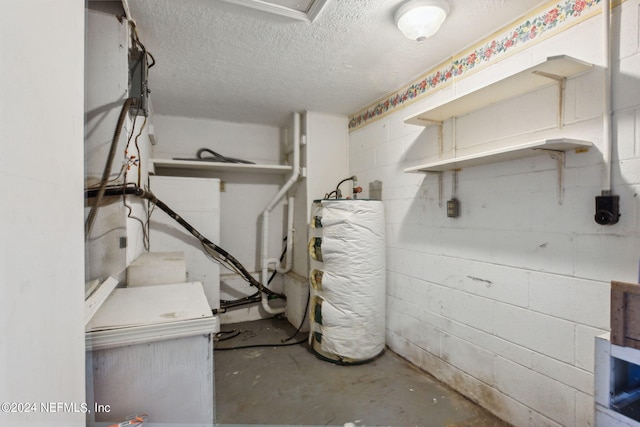 6124 Sudbury Ave S, Jacksonville, FL 32210 - basement featuring concrete block wall, water heater, and a textured ceiling