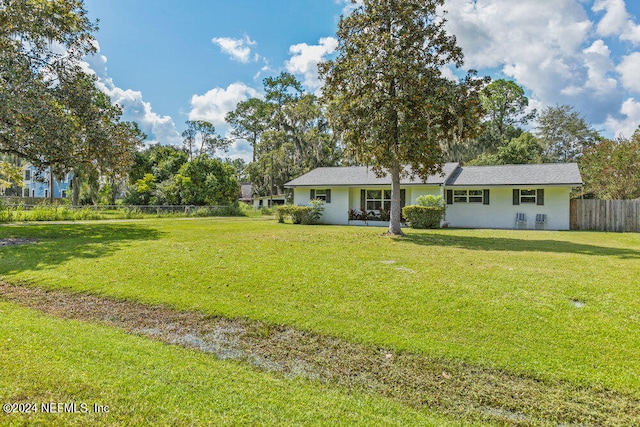 view of front of home with a front lawn