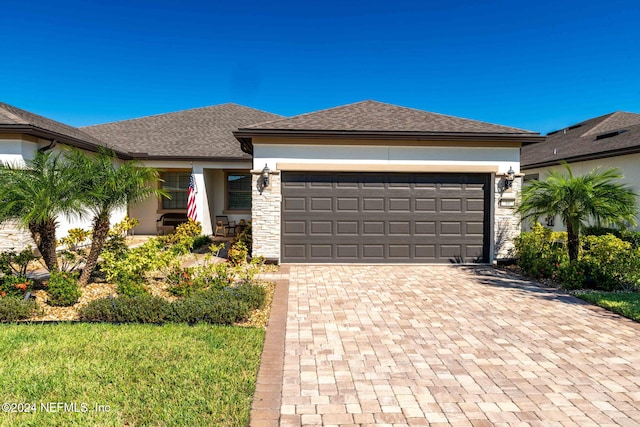 view of front of property featuring a garage