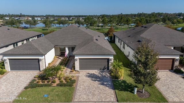 drone / aerial view featuring a water view