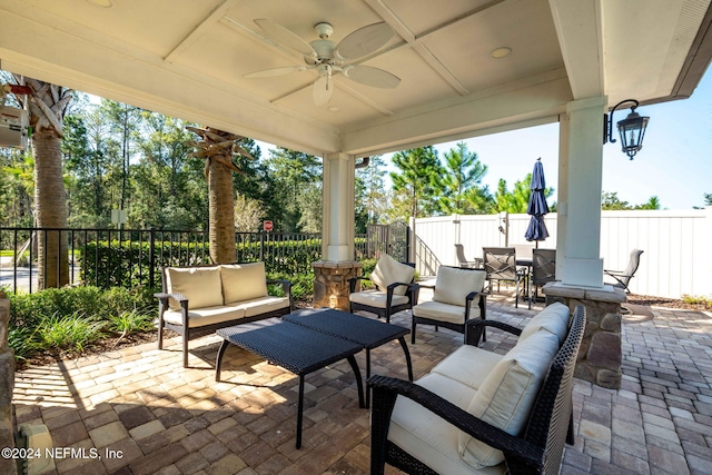 view of patio featuring outdoor lounge area and ceiling fan