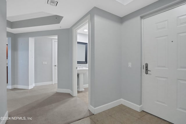 interior space featuring light colored carpet