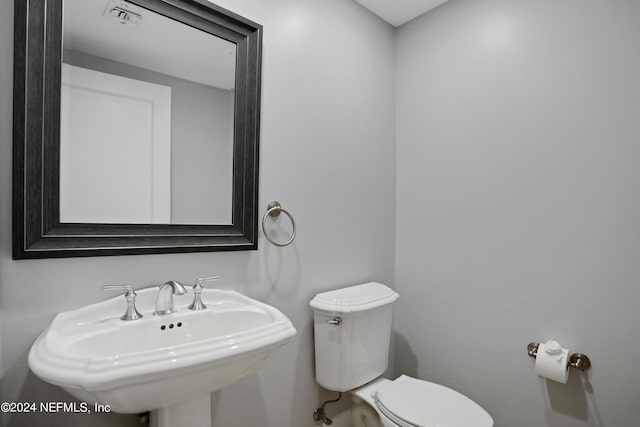 1031 1st St S Unit 504, Jacksonville Beach, FL 32250 - bathroom with a sink, visible vents, and toilet