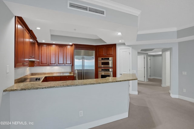 1031 1st St S Unit 504, Jacksonville Beach, FL 32250 - kitchen featuring recessed lighting, light stone counters, visible vents, a peninsula, and appliances with stainless steel finishes