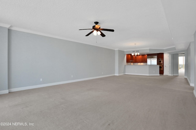 unfurnished living room featuring ceiling fan with notable chandelier, a textured ceiling, light colored carpet, and ornamental molding