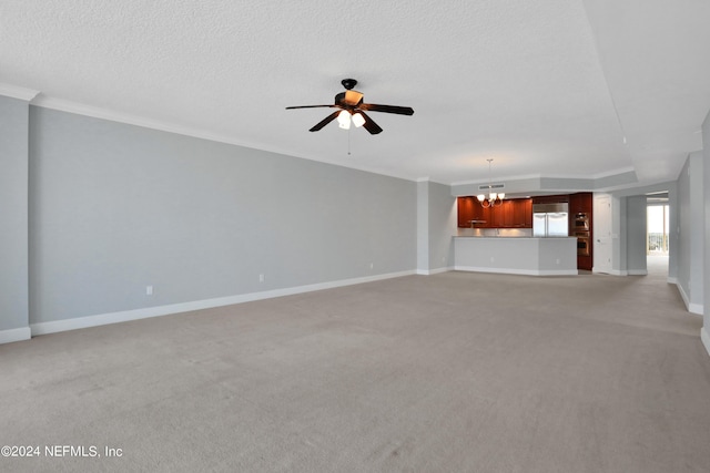 1031 1st St S Unit 504, Jacksonville Beach, FL 32250 - unfurnished living room featuring light colored carpet, ceiling fan with notable chandelier, a textured ceiling, baseboards, and ornamental molding