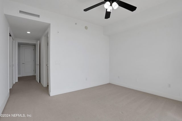 1031 1st St S Unit 504, Jacksonville Beach, FL 32250 - empty room featuring light carpet, baseboards, visible vents, and ceiling fan
