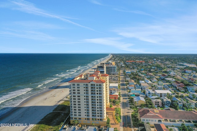 bird's eye view featuring a beach view and a water view