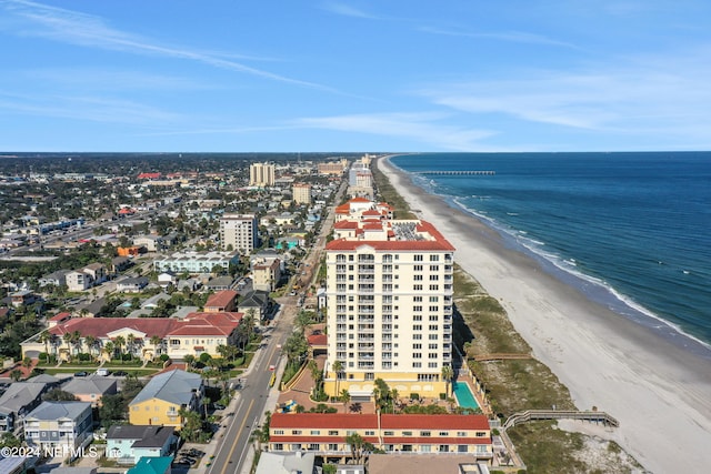 aerial view with a view of the beach and a water view